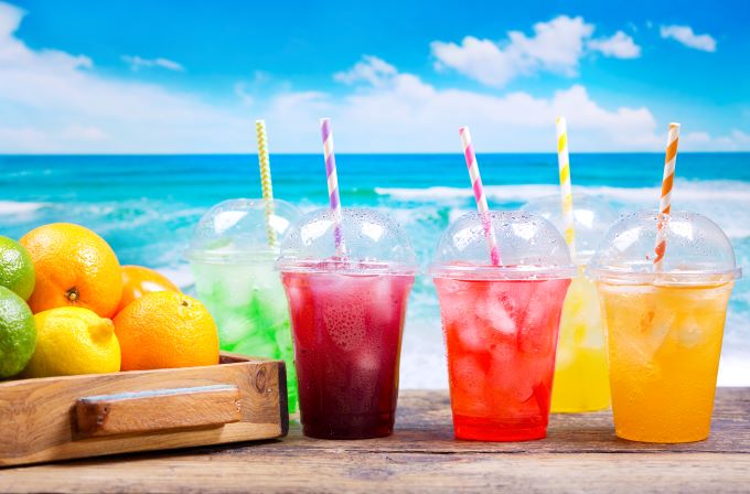 Fast Ferry Offers | Tropical Drinks at a Caribbean Beach Tropical Drinks at a Bahamas Beach